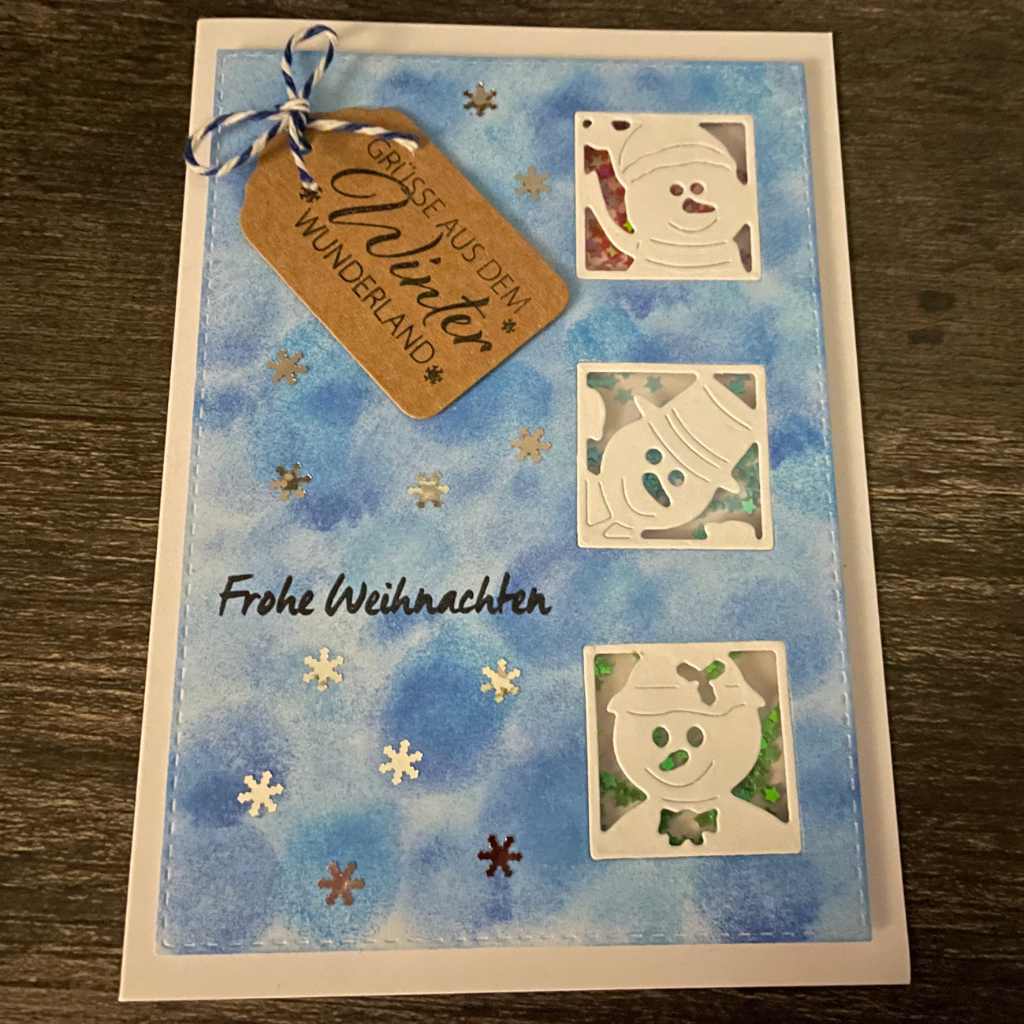 Interaktive Schneemann-Schüttelkarte – handgemacht mit Fensterfolie und 3D-Effekt.